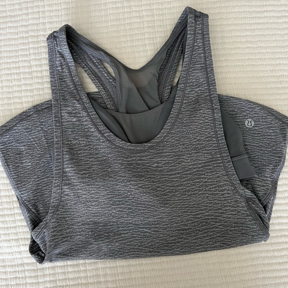 Lululemon racerback tank top. Size 2. Grayish blue. Built in bra.